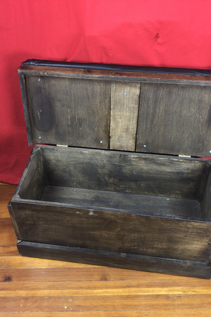 Trunk open showing false bottom